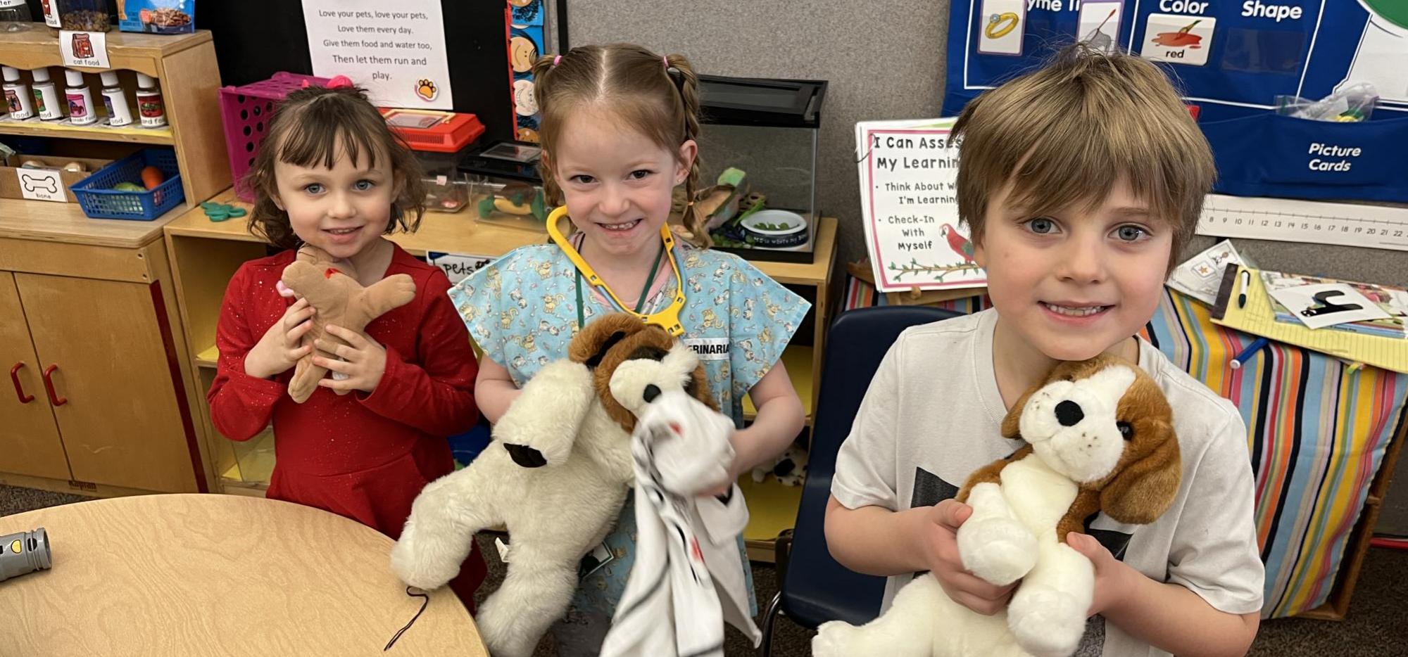 Preschoolers with stuffed animals