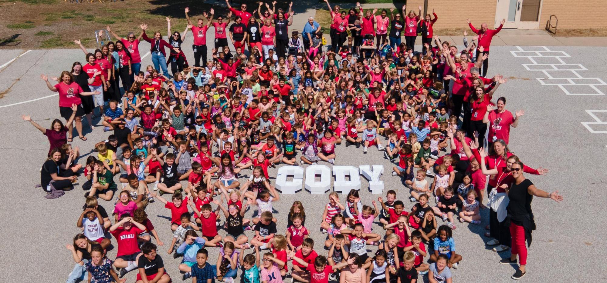 all school 60th birthday photo outside